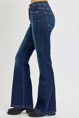 Blue flared jeans on a white background