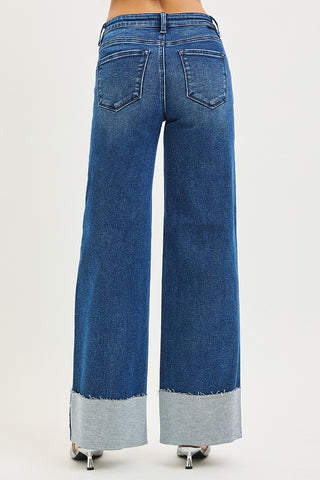 Blue wide-leg jeans on a white background