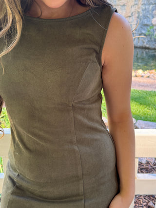 Close-up of the boat neck and faux suede texture on an olive mini dress | V-Rae's Boutique