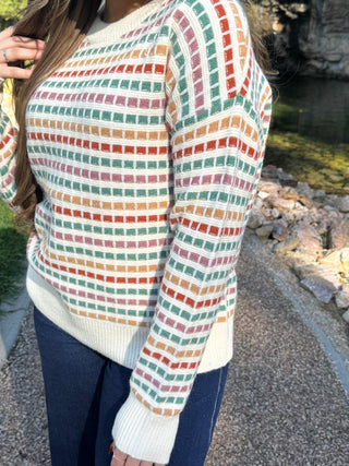 Side view of a cream grid knit sweater with dropped shoulders | V-Rae's Boutique