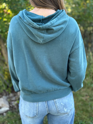 Back view of a teal vintage wash pullover hoodie | V-Rae's Boutique