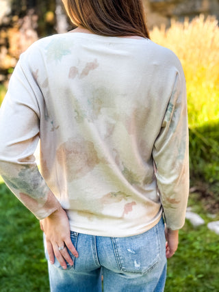 Back view of a floral watercolor batwing knit sweater | V-Rae's Boutique