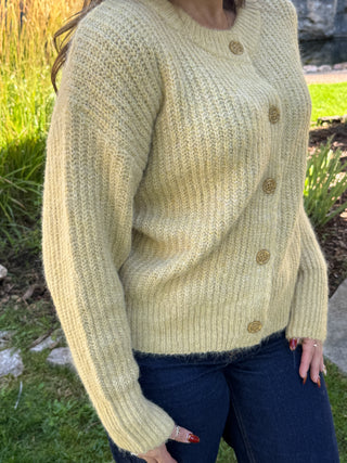 Close-up of the chunky rib knit texture on a light olive cardigan | V-Rae's Boutique