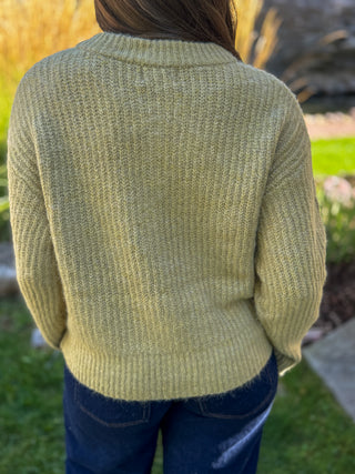 Back view of a light olive chunky ribbed knit cardigan | V-Rae's Boutique