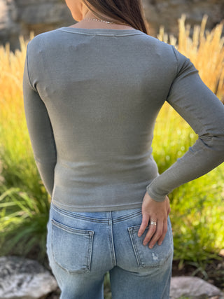 Back view of a fitted sage gray ribbed long sleeve top | V-Rae's Boutique