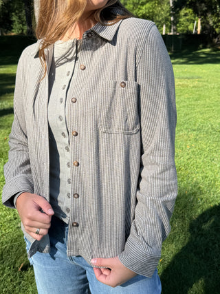 Gray striped shacket with chest pocket and wood-tone buttons worn open | V-Rae's Boutique