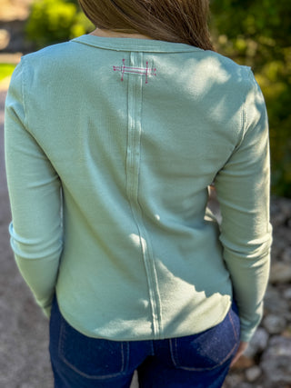 Back view of a mint green ribbed henley with center seam detail | V-Rae's Boutique