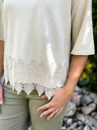 Close-up of the crochet lace hem on a cream short sleeve top | V-Rae's Boutique