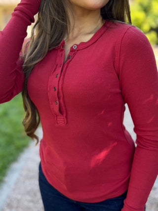 Close-up of the button placket on a red ribbed henley top | V-Rae's Boutique