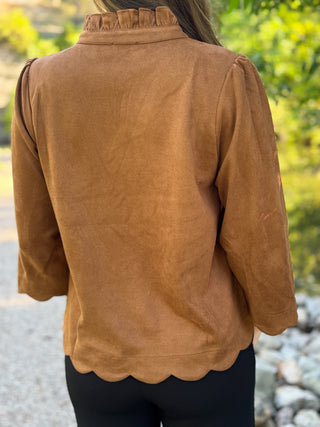 Back view of a cognac scalloped bell sleeve blouse with ruffle collar | V-Rae's Boutique
