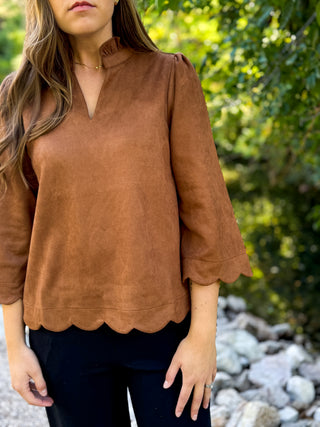 Cognac faux suede blouse with scalloped hem, worn with black pants | V-Rae's Boutique