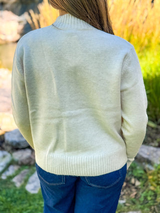 Back view of a cream suede-trim pocket cardigan | V-Rae's Boutique