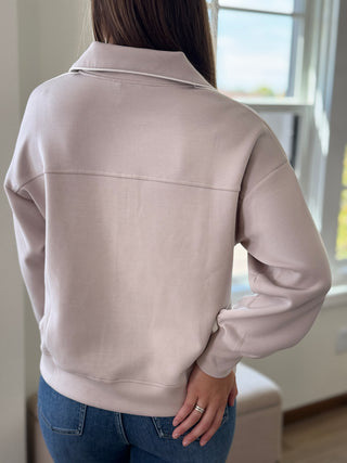 Back detail of scuba knit top.