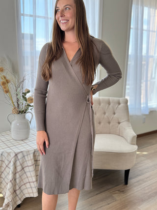 Lady standing featuring a mocha wrap sweater dress.