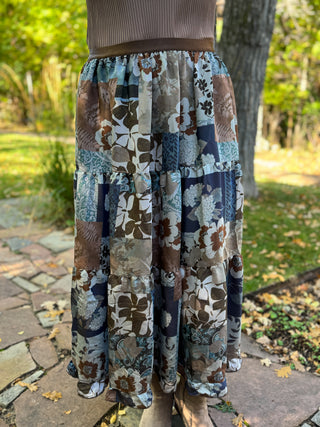 Back view of a blue and brown patchwork floral tiered maxi skirt | V-Rae's Boutique