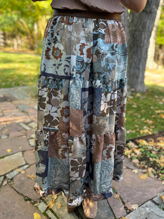 Side view of a patchwork floral tiered maxi skirt | V-Rae's Boutique