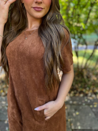 Close-up of the faux suede texture on a cognac romper | V-Rae's Boutique