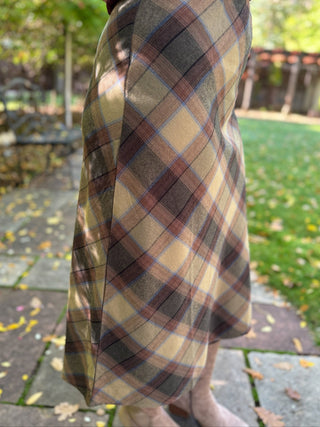 Side view of an olive bias-cut plaid midi skirt | V-Rae's Boutique