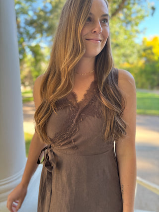 Close-up of the lace V-neck and tie on a brown wrap midi dress | V-Rae's Boutique