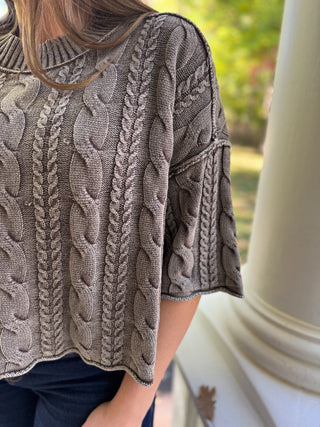 Close-up of a charcoal washed cable knit short sleeve sweater | V-Rae's Boutique