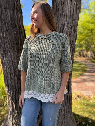 Sage cable knit short sleeve sweater with lace trim, worn with jeans | V-Rae's Boutique