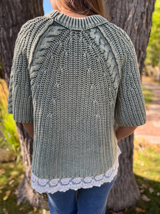 Back view of a sage cable knit lace trim sweater | V-Rae's Boutique
