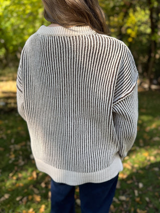 Back view of a black and cream two tone crewneck sweater | V-Rae's Boutique
