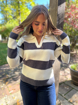Woman in a cream and charcoal striped collared sweater | V-Rae's Boutique