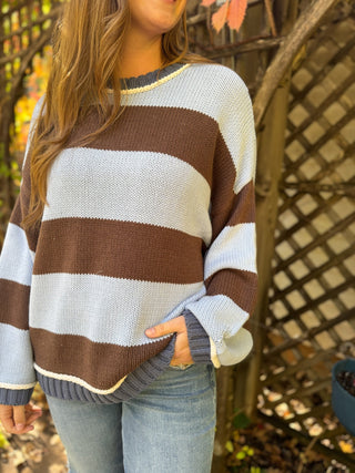 Close-up of a brown and blue wide stripe knit sweater | V-Rae's Boutique