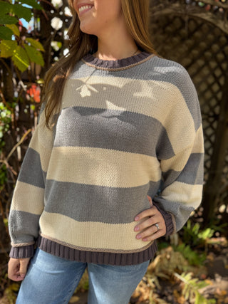 Close-up of a gray and cream wide stripe crewneck sweater | V-Rae's Boutique