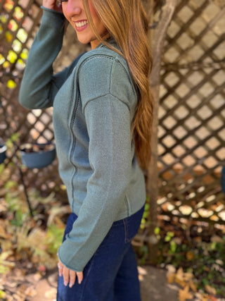 Side view of a slate blue half zip pointelle sweater | V-Rae's Boutique