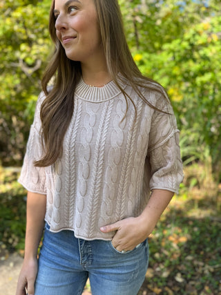 Side view of a stone washed cable knit sweater | V-Rae's Boutique