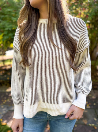 Close-up of a black and cream two tone ribbed sweater | V-Rae's Boutique