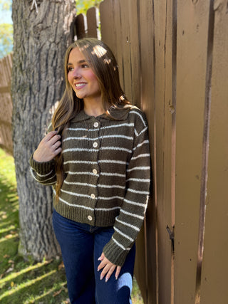 Woman in an olive and cream striped collared cardigan | V-Rae's Boutique