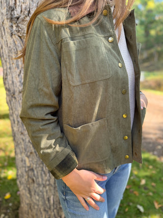 Close-up of the patch pocket on an olive corduroy barn jacket | V-Rae's Boutique