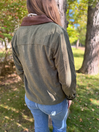 Back view of an olive corduroy barn jacket with brown collar | V-Rae's Boutique