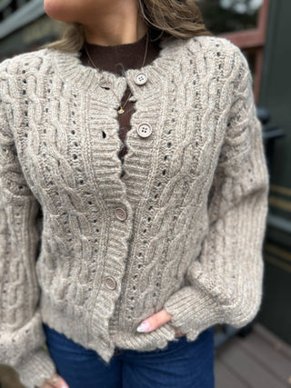 Close-up of the cable knit texture on a taupe cardigan | V-Rae's Boutique