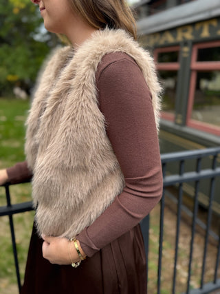 Side view of a taupe faux fur vest | V-Rae's Boutique