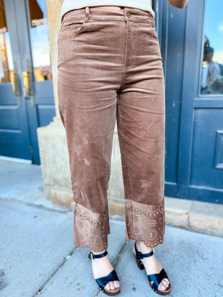 Front view of brown corduroy pants with eyelet hem | V-Rae's Boutique