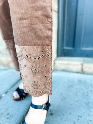 Close-up of the scalloped eyelet hem on corduroy pants | V-Rae's Boutique