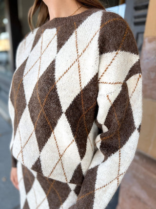 Close-up of the argyle knit on a brown crew neck sweater | V-Rae's Boutique