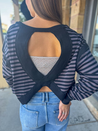 Keyhole open back on a black and charcoal striped top | V-Rae's Boutique