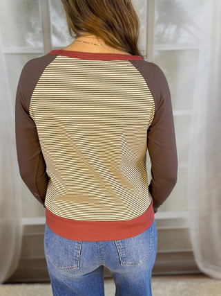 Back view of a taupe striped raglan pullover | V-Rae's Boutique