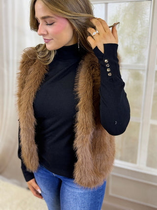 Brown faux fur vest with jeans, angled view | V-Rae's Boutique