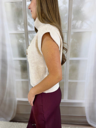 Side view of an oatmeal ribbed turtleneck sweater top | V-Rae's Boutique
