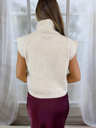 Back view of an oatmeal ribbed turtleneck sweater top | V-Rae's Boutique