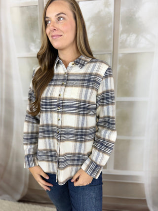 Cream and navy plaid flannel button-up, angled view | V-Rae's Boutique
