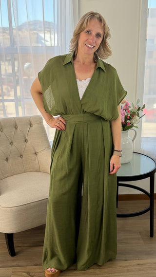 Woman in a green set. 