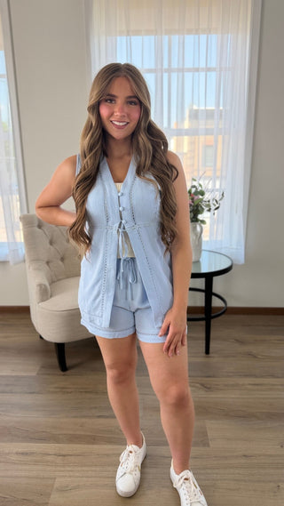 Lady wearing 2 piece linen short set.
