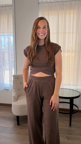 Woman wearing a brown matching set.